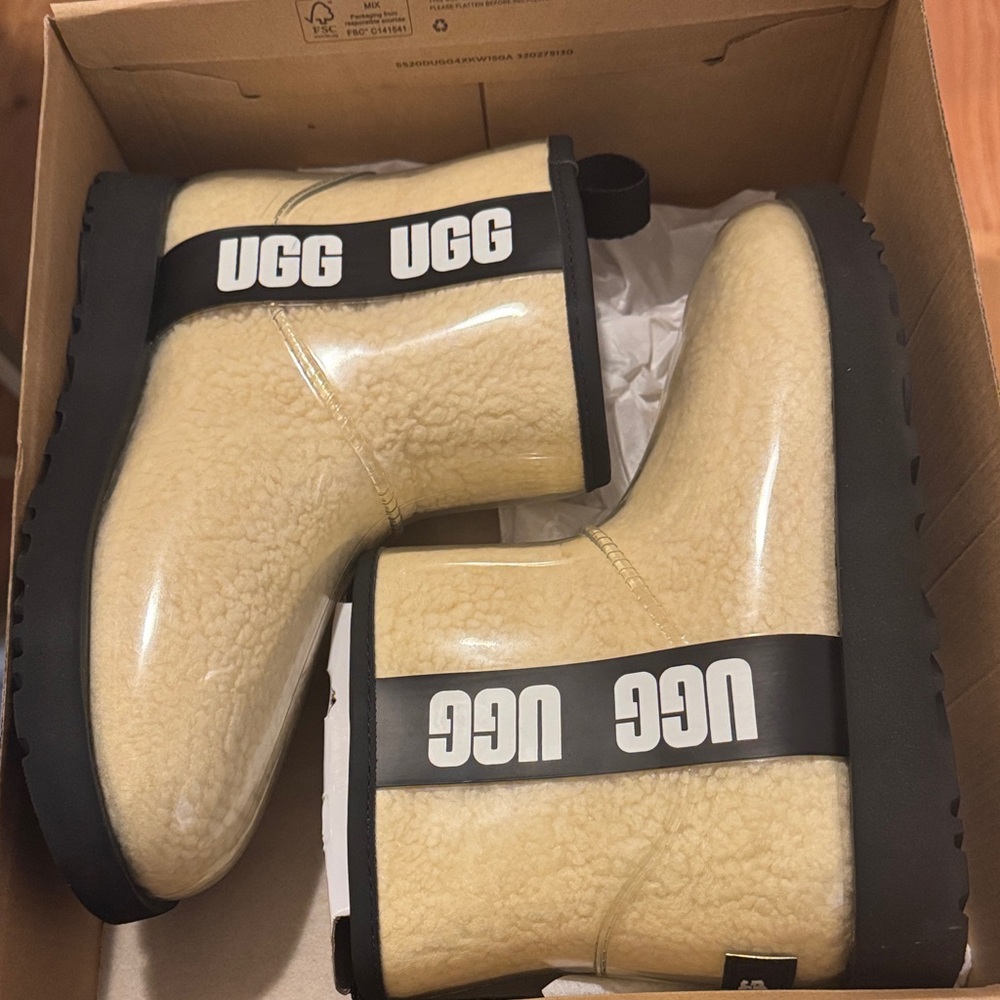UGG Cream Shearling Boots with Black Accents